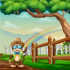 Foto op Canvas Cartoon cute monkey wearing clothes under the tree © dreamblack46