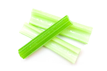 Fresh Chopped Celery Sticks with Water Drops Isolated on White Background. Vegan and Vegetarian Culture. Raw Food. Healthy Diet with Negative Calorie Content