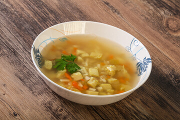Tasty chicken soup with carrot