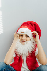 child in santa hat
