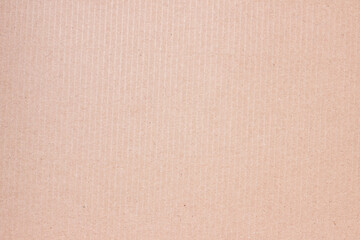 A sheet of brown cardboard. Paper natural texture.