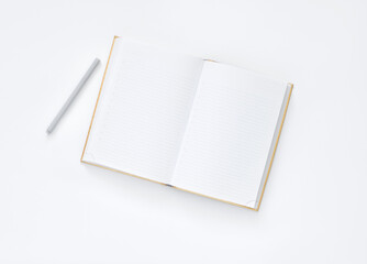 notebook with pencil on a white background
