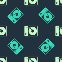 Green and beige Vinyl player with a vinyl disk icon isolated seamless pattern on blue background. Vector