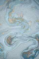 Natural luxury. Tiffany blue. Abstract ocean- ART. Style incorporates the swirls of marble or the ripples of agate. Very beautiful blue paint with the addition of gold powder.	