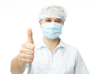 Portrait of cheerful doctor with thumb up gesture.