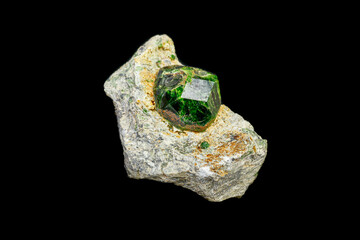 macro mineral stone Andradite on a black background