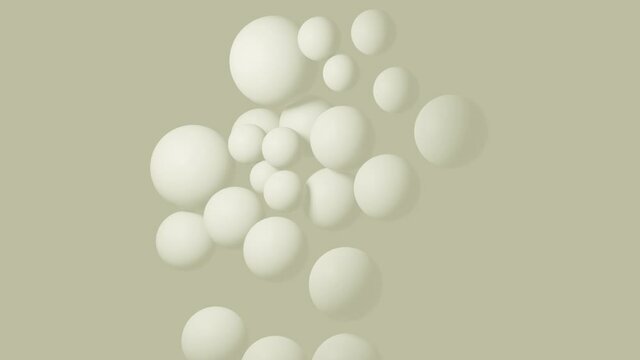 Abstract advertisement footage with sticky magnetic spheres and floating balls hitting and pushing each other