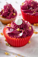Homemade red cupcakes made of raspberries for valentine's day.