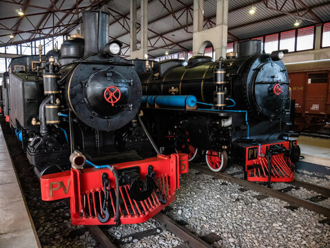 Ponferrada, Spain; 11-28-2021: Macosa PV 15 and Baldwin PV 5 steam locomotives restored and exhibited in the Ponferrada railway museum, used to transport coal owned by the steel mining company (MSP)