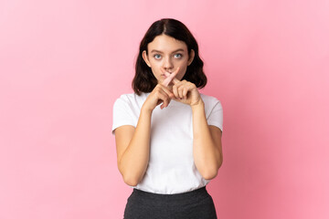 Teenager Ukrainian girl isolated on pink background showing a sign of silence gesture