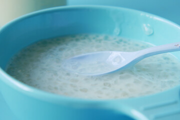 Close up of baby food in a bowl on table 