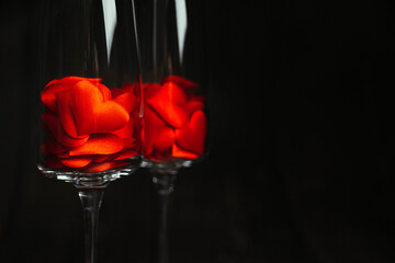 Romantic background, two glasses of champagne with red hearts, Valentine's day