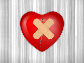 Broken heart on wooden backfound