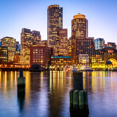 Fototapeta na wymiar Boston in Massachusetts, USA at Boston Harbor and Financial District.