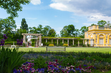 beautiful royal garden of  Willanow Palace in english style with antique statues Warsaw Poland