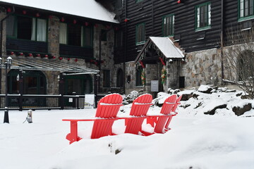 Red Chairs in Winter Scene