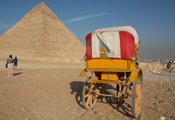 Egyptian wagon against the background of the Egyptian pyramids in Giza