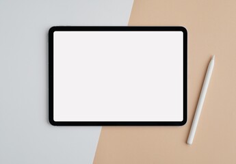 Minimal flat lay composition with white screen tablet mockup and pencil on white beige background, template for online shop design, digital planner, blog presentation.