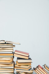 stacks of old books for learning in the library on a white background