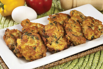 MUCVER. Traditional Zuccini Mucver. Mucver is a Turkish fritter or pancake, made from grated zucchini.