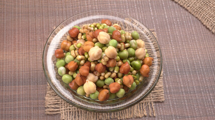 Healthy diet and vegetarian food. Mix of fresh sprouts on beautiful background. macrobiotic food. Sprouted wheat, peas, lentil seeds. Copy space 