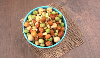 Healthy diet and vegetarian food. Mix of fresh sprouts on beautiful background. macrobiotic food. Sprouted wheat, peas, lentil seeds. Copy space 