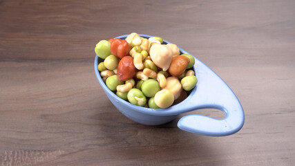 Healthy diet and vegetarian food. Mix of fresh sprouts on beautiful background. macrobiotic food. Sprouted wheat, peas, lentil seeds. Copy space 