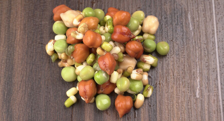 Healthy diet and vegetarian food. Mix of fresh sprouts on beautiful background. macrobiotic food. Sprouted wheat, peas, lentil seeds. Copy space 