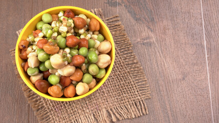 Healthy diet and vegetarian food. Mix of fresh sprouts on beautiful background. macrobiotic food. Sprouted wheat, peas, lentil seeds. Copy space 