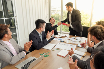 boss or manager or leader congratulations staff or employee successes in work and giving money bonus to business teamwork group