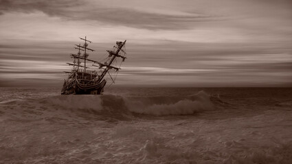 Old Sailing-ship in storm sea, dramatic sunset in the background