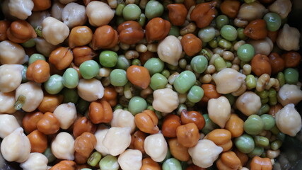 Healthy diet and vegetarian food. Mix of fresh sprouts on beautiful background. macrobiotic food. Sprouted wheat, peas, lentil seeds. Copy space 