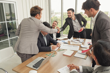 boss or manager or leader congratulations staff or employee successes in work and giving money bonus to business teamwork group