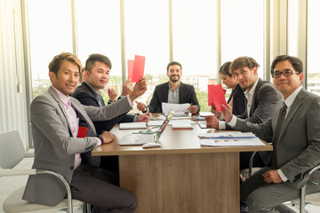 boss or manager or leader congratulations staff or employee successes in work and giving money bonus to business teamwork group