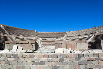 ruins of small and cosy roman theatre in archaeological site Pergamon in Turkey, lower city Asclepium