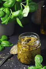 Homemade pesto in a glass jar