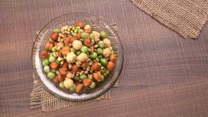 Healthy diet and vegetarian food. Mix of fresh sprouts on beautiful background. macrobiotic food. Sprouted wheat, peas, lentil seeds. Copy space 
