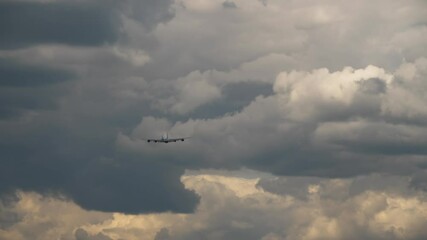 Airplane taking off, stormy sky