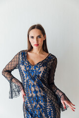 Beautiful Woman in Blue Beige Dress Fashion Portrait