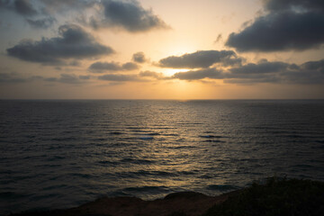 Fototapeta na wymiar Yellow sunset over the Mediterranean horizontal