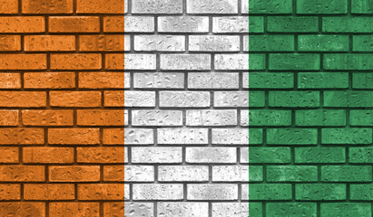Côte d'Ivoire flag on a brick wall