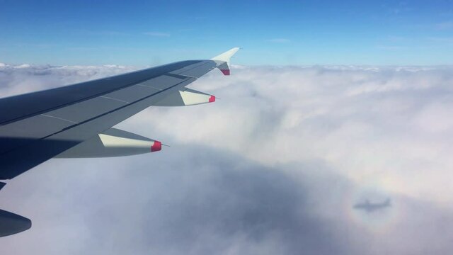 Aeroplane above the cloud with turbulence 