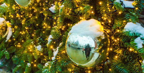 silver christmas decoration balls on christmas tree