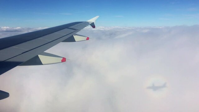 Aeroplane above the cloud with turbulence 