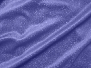 Fototapeta na wymiar Shiny purple blue crumpled fabric texture background