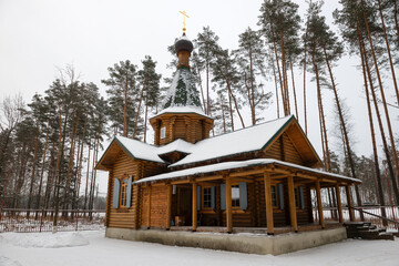 Chapel of Peter and Fevronia of Murom near the Vvedenskaya Island Desert on a winter day