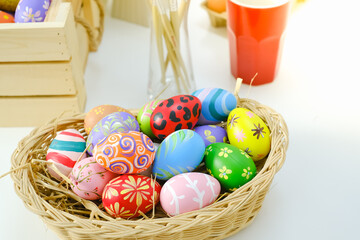 Colorful easter eggs in Basket