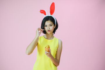 Portrait beautiful young asia girl with painted eggs, Happy easter day