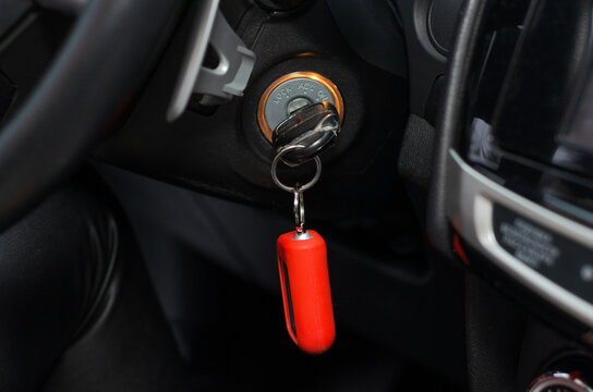 key with alarm key fob from the car in the ignition lock