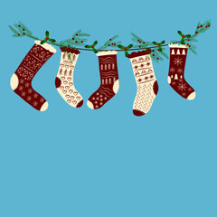 Vector image. Christmas card. Christmas socks for gifts on a garland of pine needles. Place for an inscription.